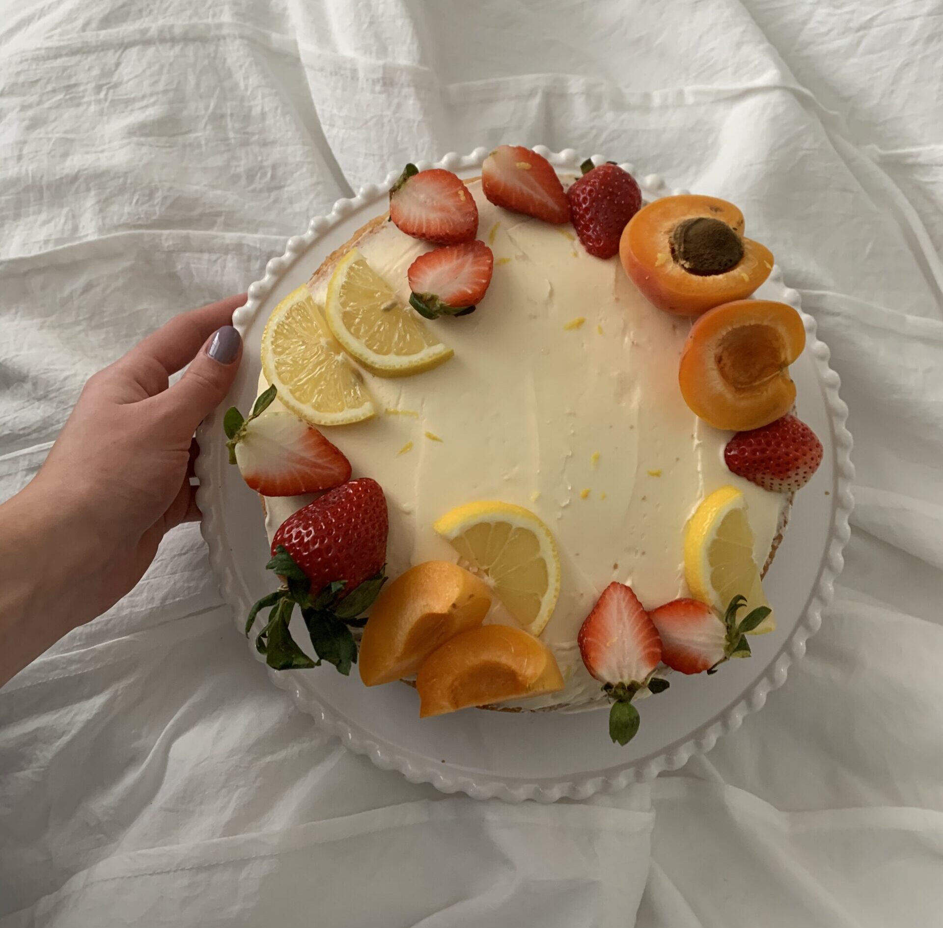 Cake with fruit around edges
